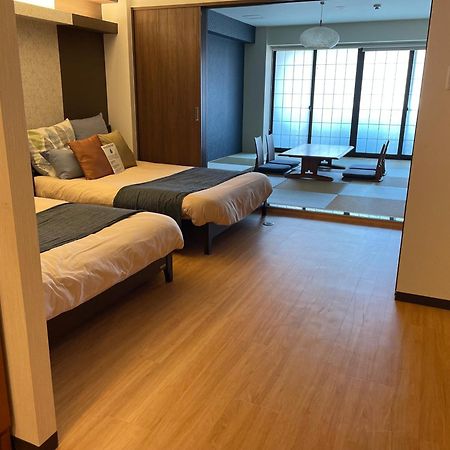 Guest House Sakura Osaka Esterno foto